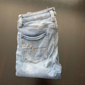 Light Washed Ripped American Eagle Super Hi-Rise Jeggings